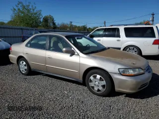2001 Honda Accord LX z VIN 1HGCG66581A001943, wystawiony jako Copart lot #54976975 z przebiegiem 122 968 mil mil oraz Czysty tytuł • Clean title. Historia ofert i sprzedaży dostępna na DreamBid. Obrazek 4.