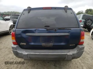 2002 Jeep Grand Cherokee z VIN 1J4GX38S42C229150, wystawiony jako Copart lot #72586834 z przebiegiem 201 103 mil mil oraz Szkoda całkowita • Salvage title. Historia ofert i sprzedaży dostępna na DreamBid. Obrazek 6.