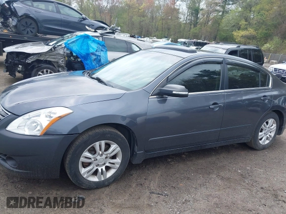 2010 Nissan Altima 2.5 S with VIN 1N4AL2AP9AN418781, listed as a IAAI auction lot 42185127 with 126,805 mi miles. Bid and sale history available at carsss.com. Image 6.