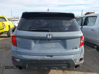 2023 Honda Passport EX-L with VIN 5FNYF8H52PB027082, listed as a IAAI auction lot 41788783 with 32,186 mi miles and . Bid and sale history available at carsss.com. Image 16.