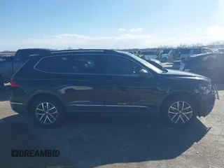 2020 Volkswagen Tiguan SE with VIN 3VV3B7AX0LM106561, listed as a IAAI auction lot 41712689 with 85,374 mi miles and . Bid and sale history available at DreamBid. Image 14.