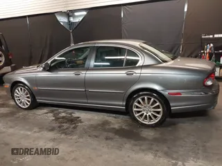 2007 Jaguar X-Type z VIN SAJWA51A37WJ17866, wystawiony jako IAAI lot #41536063 z przebiegiem 121 177 mil mil oraz . Historia ofert i sprzedaży dostępna na DreamBid. Obrazek 14.