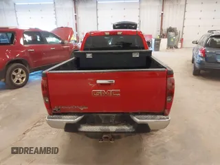 2011 GMC Canyon z VIN 1GTJ6NFE1B8109333, wystawiony jako IAAI lot #42035352 z przebiegiem 135 403 mil mil oraz . Historia ofert i sprzedaży dostępna na DreamBid. Obrazek 16.
