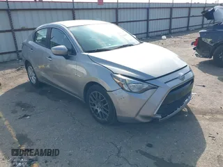 2016 Scion iA z VIN 3MYDLBZV7GY143564, wystawiony jako IAAI lot #41569450 z przebiegiem 142 619 mil mil oraz . Historia ofert i sprzedaży dostępna na DreamBid. Obrazek 1.