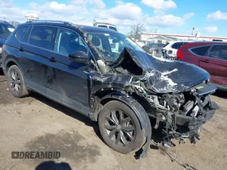 2023 Volkswagen Tiguan SE with VIN 3VVNB7AX1PM040486, listed as a IAAI auction lot 41685174 with 42,928 mi miles and . Bid and sale history available at DreamBid. Image 1.