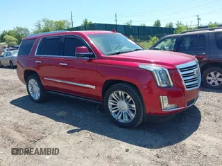 2015 Cadillac Escalade Platinum z VIN 1GYS4PKJXFR636029, wystawiony jako IAAI lot #42305137 z przebiegiem 81 693 mil mil oraz . Historia ofert i sprzedaży dostępna na DreamBid. Obrazek 1.