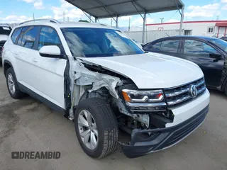 2018 Volkswagen Atlas SE z VIN 1V2KR2CA3JC521663, wystawiony jako IAAI lot #41949334 z przebiegiem 74 613 mil mil oraz . Historia ofert i sprzedaży dostępna na DreamBid. Obrazek 1.