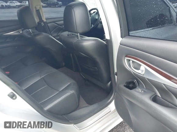 2013 Infiniti M with VIN JN1BY1AP4DM513899, listed as a IAAI auction lot 41854573 with 202,480 mi miles and . Bid and sale history available at carsss.com. Image 8.