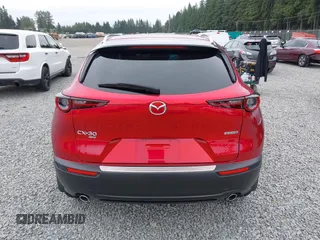 2023 Mazda CX-30 S Premium with VIN 3MVDMBDM1PM520048, listed as a IAAI auction lot 42468172 with 7,277 mi miles and . Bid and sale history available at DreamBid. Image 17.