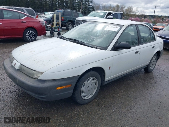 1997 Saturn SL with VIN 1G8ZF5283VZ400170, listed as a IAAI auction lot 41884490 with 171,635 mi miles. Bid and sale history available at carsss.com. Image 2.