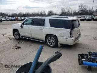 2015 GMC Yukon XL SLT with VIN 1GKS2HKC8FR259966, listed as a Copart auction lot 50410195 with 158,367 mi miles and Salvage Title. Bid and sale history available at carsss.com. Image 2.