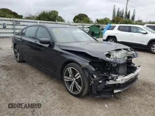 2019 BMW 7 Series 740i with VIN WBA7E2C53KB217288, listed as a Copart auction lot 37246864 with 50,967 mi miles. Bid and sale history available at carsss.com. Image 4.
