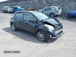 2012 Toyota Yaris L with VIN JTDKTUD35CD529596, listed as a IAAI auction lot 41439354 with 87,493 mi miles. Bid and sale history available at carsss.com. Image 1.
