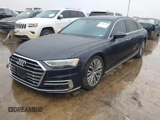 2019 Audi A8 L with VIN WAU8DAF82KN004676, listed as a IAAI auction lot 41086272 with 58,217 mi miles. Bid and sale history available at carsss.com. Image 2.