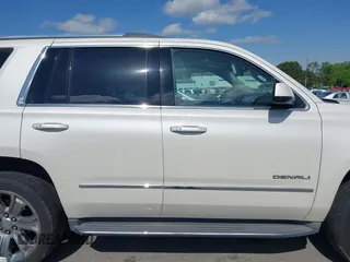 2015 GMC Yukon Denali with VIN 1GKS1CKJ3FR230797, listed as a IAAI auction lot 41977294 with 174,633 mi miles. Bid and sale history available at carsss.com. Image 13.