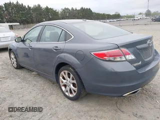 2009 Mazda 6 S Grand Touring with VIN 1YVHP82B295M06383, listed as a IAAI auction lot 42079585 with 109,008 mi miles and . Bid and sale history available at DreamBid. Image 3.