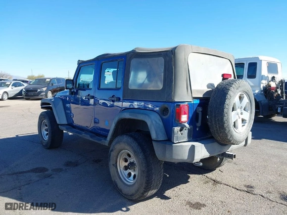 2010 Jeep Wrangler Unlimited Sport with VIN 1J4BA3H19AL197779, listed as a IAAI auction lot 41620455 with 161,697 mi miles. Bid and sale history available at carsss.com. Image 3.