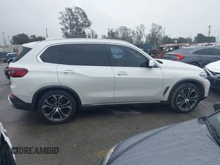 2021 BMW X5 sDrive40i with VIN 5UXCR4C03M9F24817, listed as a IAAI auction lot 41512172 with 54,867 mi miles. Bid and sale history available at carsss.com. Image 13.