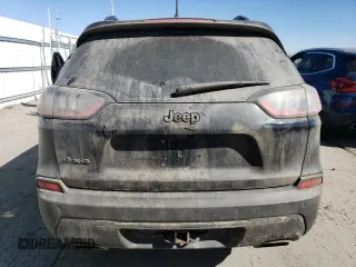 2019 Jeep Cherokee Altitude z VIN 1C4PJMLX8KD282895, wystawiony jako Copart lot #47054495 z przebiegiem 159 831 mil mil oraz Szkoda całkowita • Salvage title. Historia ofert i sprzedaży dostępna na DreamBid. Obrazek 6.