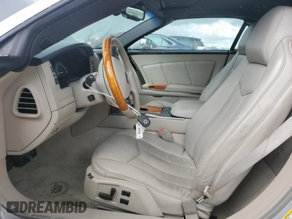 2006 Cadillac XLR z VIN 1G6YV36A365601441, wystawiony jako Copart lot #73945994 z przebiegiem Nie podano mil oraz Szkody całkowita. Historia ofert i sprzedaży dostępna na DreamBid. Obrazek 7.