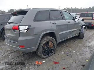 2021 Jeep Grand Cherokee Laredo X z VIN 1C4RJFAG9MC590268, wystawiony jako IAAI lot #41614514 z przebiegiem 60 933 mil mil oraz . Historia ofert i sprzedaży dostępna na DreamBid. Obrazek 4.