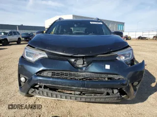 2018 Toyota RAV4 Hybrid SE with VIN JTMJJREV2JD230126, listed as a Copart auction lot 62574005 with 196,846 mi miles and Salvage title. Bid and sale history available at DreamBid. Image 5.