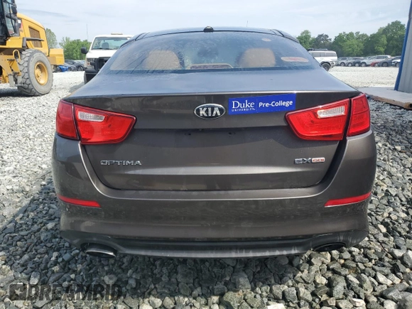 2014 Kia Optima EX z VIN 5XXGN4A76EG337099, wystawiony jako Copart lot #54508445 z przebiegiem 317 116 mil mil oraz Czysty tytuł • Clean title. Historia ofert i sprzedaży dostępna na DreamBid. Obrazek 6.