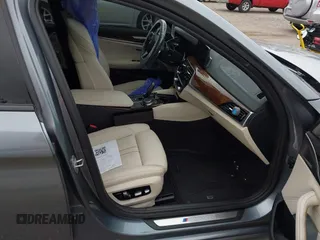2019 BMW 5 Series M550i xDrive with VIN WBAJB9C57KB289439, listed as a IAAI auction lot 40634389 with 85,992 mi miles and . Bid and sale history available at DreamBid. Image 5.
