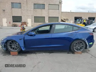 2021 Tesla Model 3 Long Range with VIN 5YJ3E1EB6MF878411, listed as a IAAI auction lot 41986947 with 71,978 mi miles and . Bid and sale history available at DreamBid. Image 15.