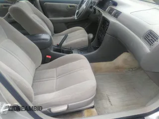 2001 Toyota Camry CE z VIN 4T1BG22K11U803209, wystawiony jako IAAI lot #40770527 z przebiegiem 210 611 mil mil oraz . Historia ofert i sprzedaży dostępna na DreamBid. Obrazek 5.