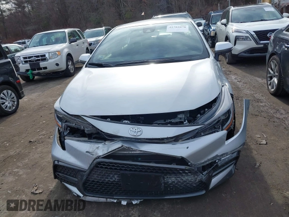 2022 Toyota Corolla SE with VIN JTDS4MCE2NJ087509, listed as a IAAI auction lot 41782078 with 34,627 mi miles and . Bid and sale history available at DreamBid. Image 12.