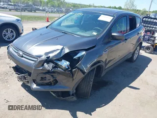 2016 Ford Escape SE z VIN 1FMCU9GX1GUB92472, wystawiony jako IAAI lot #42133744 z przebiegiem 184 000 mil mil oraz . Historia ofert i sprzedaży dostępna na DreamBid. Obrazek 2.