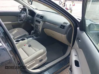 2010 Ford Fusion Hybrid with VIN 3FADP0L35AR168002, listed as a IAAI auction lot 42090134 with 147,831 mi miles. Bid and sale history available at carsss.com. Image 5.