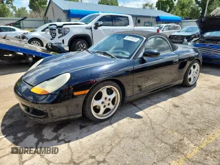 1999 Porsche Boxster with VIN WP0CA2987XS620096, listed as a Copart auction lot 63112875 with Not provided miles and Clean title. Bid and sale history available at DreamBid. Image 1.