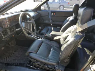 1987 Chrysler Conquest z VIN JJ3CC54N1HZ023316, wystawiony jako Copart lot #83362964 z przebiegiem 196 755 mil mil oraz Szkody całkowita. Historia ofert i sprzedaży dostępna na DreamBid. Obrazek 7.