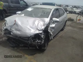 2015 Toyota Corolla L with VIN 5YFBURHE0FP281457, listed as a IAAI auction lot 39664934 with Not Provided miles and . Bid and sale history available at DreamBid. Image 2.