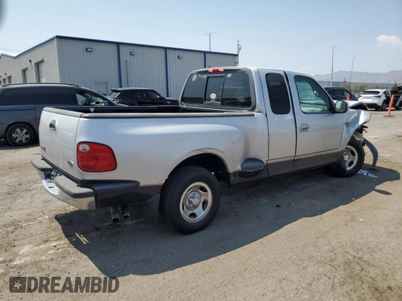 2001 Ford F-150 XL with VIN 1FTRX07L71KA57207, listed as a Copart auction lot 64843825 with Not provided miles and Salvage title. Bid and sale history available at DreamBid. Image 3.