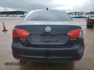 2011 Volkswagen Jetta SE with VIN 3VWDZ7AJXBM318518, listed as a Copart auction lot 50718595 with 164,353 mi miles and Salvage title. Bid and sale history available at DreamBid. Image 6.