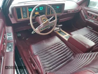 1988 Cadillac Eldorado with VIN 1G6EL1155JU622216, listed as a Copart auction lot 83659204 with 44,668 mi miles and Salvage Title. Bid and sale history available at DreamBid. Image 8.