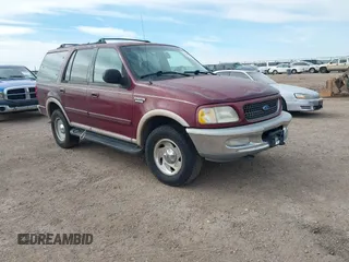 1997 Ford Expedition XLT z VIN 1FMFU18L1VLC06223, wystawiony jako IAAI lot #41527431 z przebiegiem 272 108 mil mil oraz . Historia ofert i sprzedaży dostępna na DreamBid. Obrazek 1.