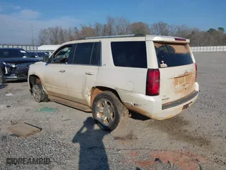 2015 Chevrolet Tahoe LTZ with VIN 1GNSCCKCXFR287609, listed as a IAAI auction lot 41688936 with 112,678 mi miles. Bid and sale history available at carsss.com. Image 3.