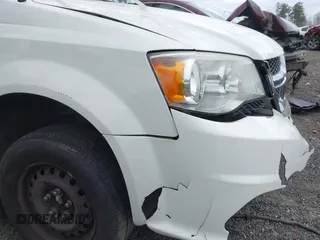 2012 Dodge Grand Caravan SE with VIN 2C4RDGBG9CR232038, listed as a IAAI auction lot 41823766 with 77,468 mi miles and . Bid and sale history available at DreamBid. Image 14.