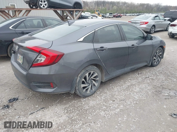 2018 Honda Civic EX with VIN 2HGFC2F79JH570403, listed as a IAAI auction lot 42018123 with 165,821 mi miles and . Bid and sale history available at DreamBid. Image 4.