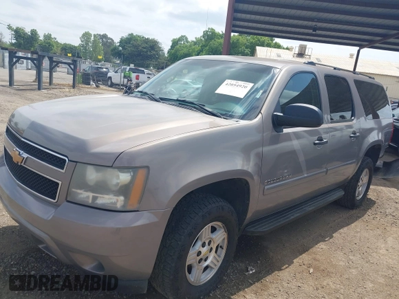 2007 Chevrolet Suburban LT z VIN 1GNFK163X7J289542, wystawiony jako IAAI lot #42054920 z przebiegiem 146 702 mil mil oraz . Historia ofert i sprzedaży dostępna na DreamBid. Obrazek 18.