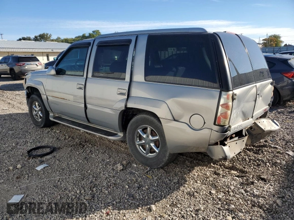 1999 GMC Denali z VIN 1GKEK13R4XR918005, wystawiony jako Copart lot #74964184 z przebiegiem 206 584 mil mil oraz Nie do naprawy. Historia ofert i sprzedaży dostępna na DreamBid. Obrazek 2.