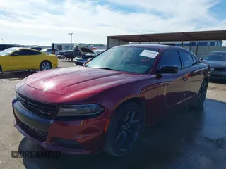 2020 Dodge Charger SXT with VIN 2C3CDXBG3LH104815, listed as a IAAI auction lot 41328084 with 130,322 mi miles and . Bid and sale history available at DreamBid. Image 2.