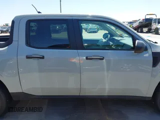2022 Ford Maverick XL z VIN 3FTTW8E97NRA43470, wystawiony jako IAAI lot #41975446 z przebiegiem 73 321 mil mil oraz . Historia ofert i sprzedaży dostępna na DreamBid. Obrazek 14.