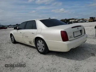 2003 Cadillac DeVille DTS z VIN 1G6KF57973U204531, wystawiony jako Copart lot #45712115 z przebiegiem 107 737 mil mil oraz Szkoda całkowita • Salvage title. Historia ofert i sprzedaży dostępna na DreamBid. Obrazek 2.