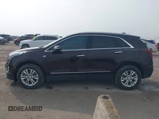 2021 Cadillac XT5 FWD Luxury with VIN 1GYKNAR44MZ184070, listed as a IAAI auction lot 41934265 with 60,596 mi miles and . Bid and sale history available at DreamBid. Image 14.