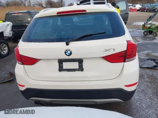 2013 BMW X1 28i with VIN WBAVM1C58DVW45962, listed as a IAAI auction lot 41323144 with 117,363 mi miles. Bid and sale history available at carsss.com. Image 16.